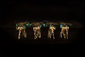 Esstisch / originelles Design / Glas / Gusseisen / Bronze