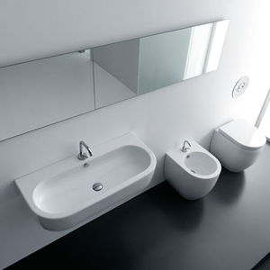 Wand-Waschbecken / oval / Keramik / modern