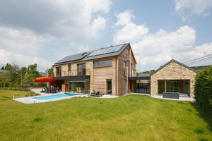 Fertigbauhaus / aus Massivholz-Block / modern / aus Holz
