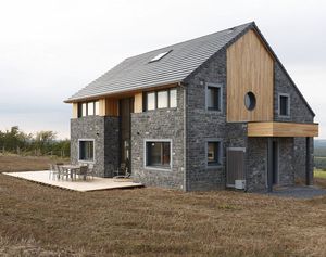 Fertigbauhaus / Passiv / aus Massivholz-Block / modern