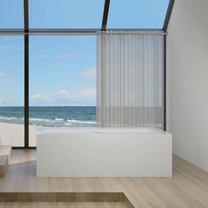 freistehende Badewanne / aus Corian® / Wassermassage / für Chromotherapie