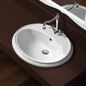 Einbauwaschbecken / oval / Keramik / modern