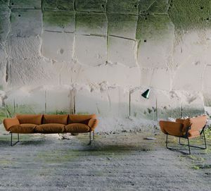 modernes Sofa / Stahl / aus Polyesterfasern / Stoff