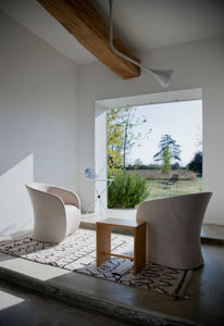 moderner Sessel / Kuhfell / Textil / Leder