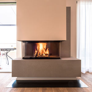 holzbefeuerter Kamin / modern / Geschlossene Feuerstelle / 3 Sichtseiten