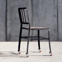 Moderner Stuhl / mit Rollen / Metall / Leder