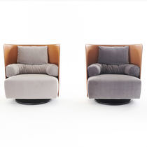 Drehbarer Sessel / modern / Kuhfell / Stoff