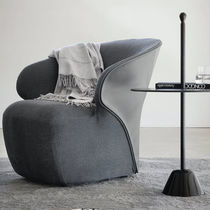 Moderner Sessel / Stoff / Leder / Kuhfell