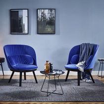 Moderner Couchtisch / Metall / rund / Innenraum