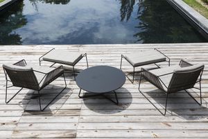 moderner Couchtisch / HPL / rund / Garten