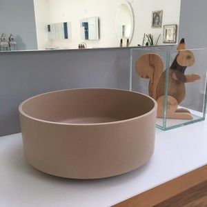 Aufsatzwaschbecken / rund / Mineralwerkstoff / modern
