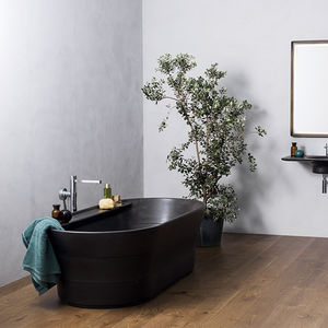 freistehende Badewanne / oval / Naturstein