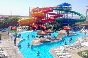 drehende Rutsche / für Aquapark / rohrförmig