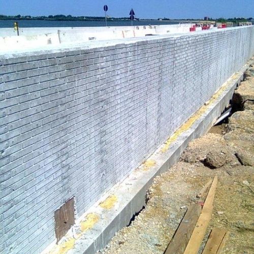 Schalungsform für Wand - P-53 - Plasmacem - Ziegeloptik / Gusseisen / für Sichtbeton