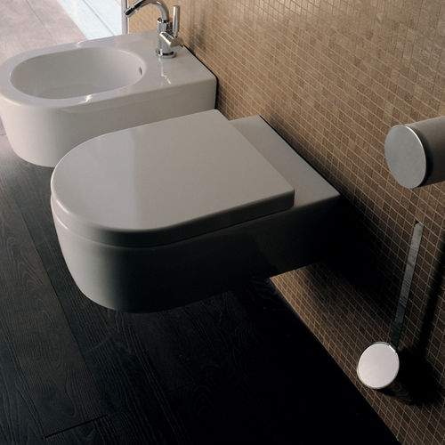 Wandhängendes WC - LINK  - FLAMINIA - Keramik / von Giulio Cappellini / für Privatgebrauch