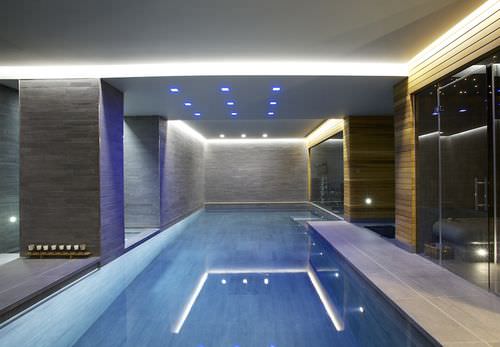 Schwimmbecken für den Innenraum - GUNCAST SWIMMING POOLS - erdverlegt / Beton