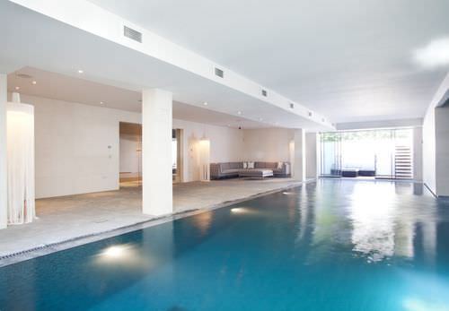 Schwimmbecken für den Innenraum - WIMBLEDON - GUNCAST SWIMMING POOLS - erdverlegt / Stein
