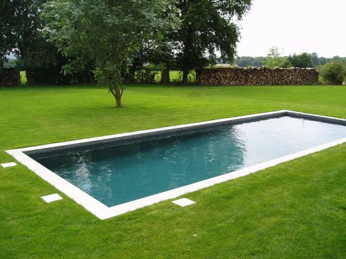 Schwimmbecken für Außenbereich - UNIQUE - GUNCAST SWIMMING POOLS - erdverlegt / Beton