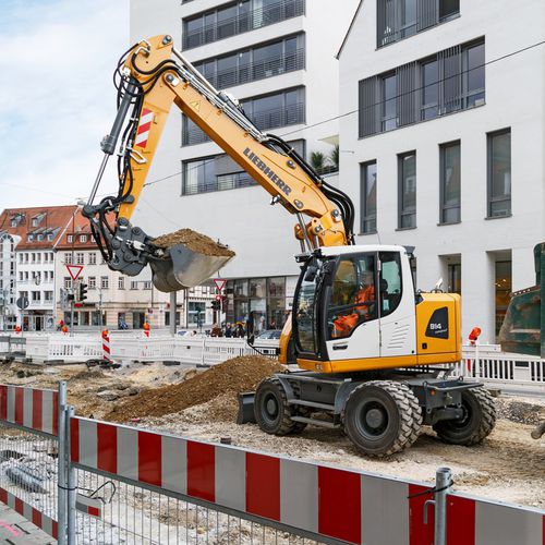 Mittelgroßer Bagger - A 914 LITRONIC - Liebherr  - mit Gummireifen / kompakt / mit geringem Treibstoffverbrauch