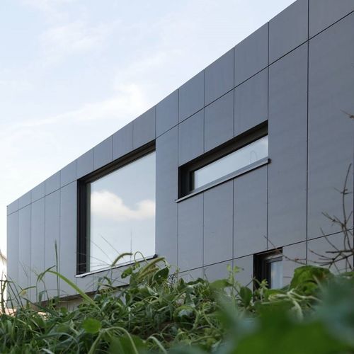 Paneel-Fassadenverkleidung - CELLON - EFH OEHNINGEN - Bruag Design Factory AG - Verbundwerkstoff / HPL / glatt