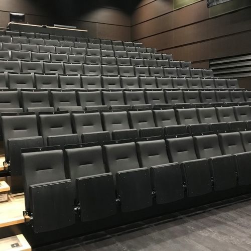 Moderner Hörsaalstuhl - Monza - Jezet Seating - für den Innenraum / feuerfester Stoff / klappbar