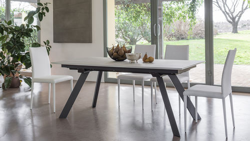 Moderner Esstisch - TRINITY - altacom italia - Keramik / Gestell aus Metall / rechteckig