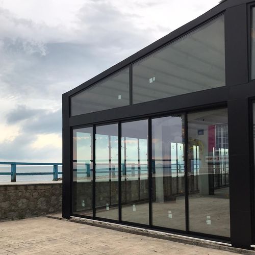 Schiebe-Stapel-Terrassentür - WITH THRESHOLD - BKS balcony glazing systems - Aluminium / dreiflügelig / zweiflügelig