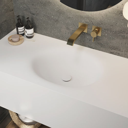 Wand-Waschbecken - DELTA - Riluxa - Corian® / mit integrierter Waschtischplatte / nach Maß