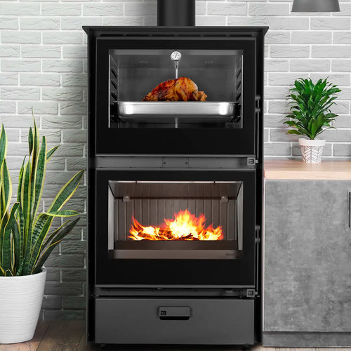 Holz-Kaminofen - BAKE 70 - BELLIDO Manufacturas Metálicas, S.L. - 5 kW...10 kW / auf Füßen / modern