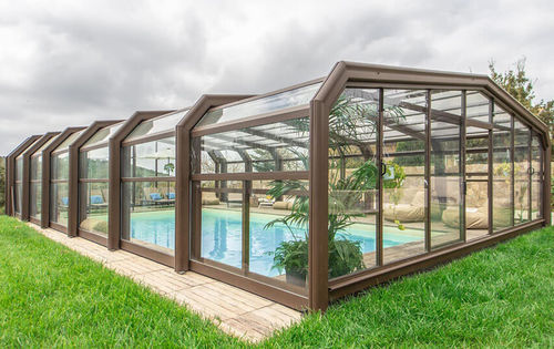 Hohe Schwimmbadüberdachung - Itálica - COVERTTO - teleskopisch / Aluminium / Glas