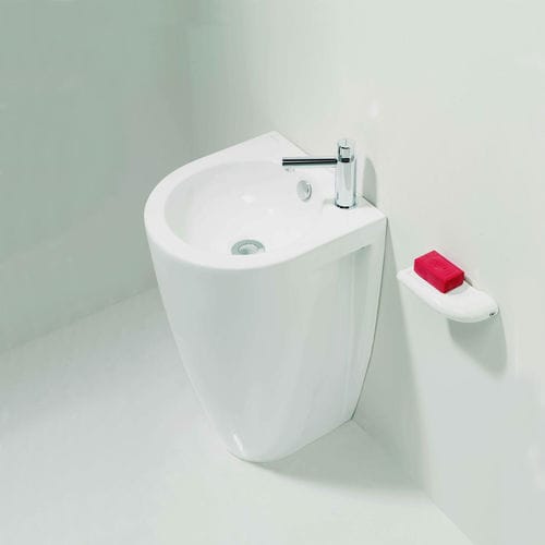 Bodenstehendes Waschbecken - JÚNIOR - Valadares - Keramik / Kalkstein / halbrund