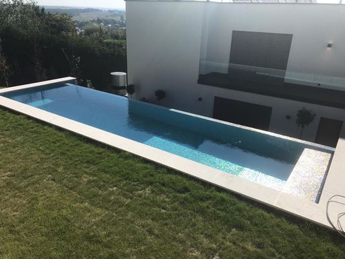Maßgefertigtes Schwimmbecken - ABI - Tilestone Pools one piece tiled pools - Schwimmbahn / Fertigbau / für Außenbereich