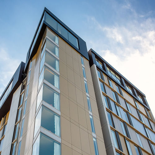 Kassetten-Fassadenverkleidung - THE BAXTER INTERNATIONAL HOTEL - ALUCOBOND - Verbundwerkstoff / Aluminium / Bronze