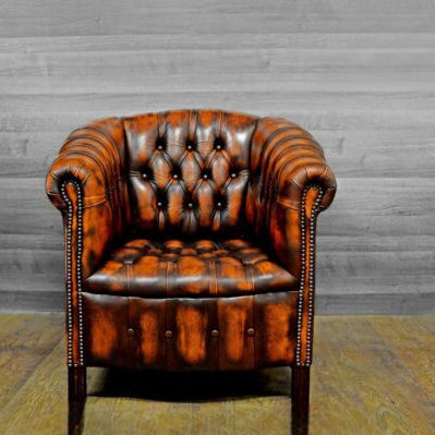 Moderner Sessel - ORANGE - Harleq - Leder / braun / mit Mittelfuß