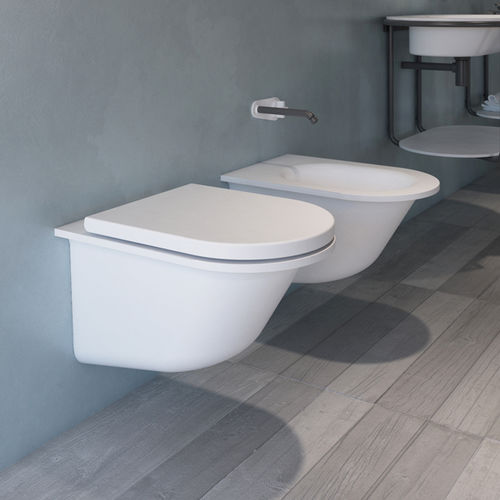 Wandhängendes WC - T13207 - Munk Building Materials Co., Ltd. - Mineralwerkstoff / für Privatgebrauch / für Gewerbegebrauch