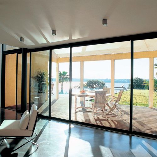 Glasschiebetür - INFINITY - Aliplast - Aluminium / mit Dreifachverglasung / mit Wärmedämmung