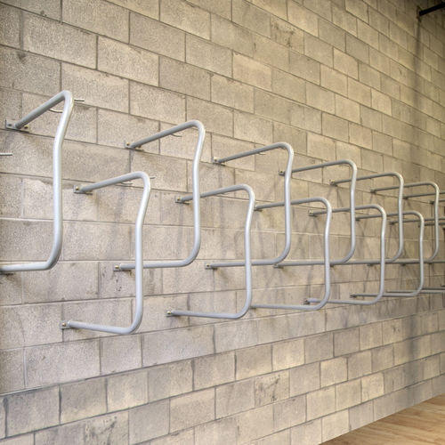 Wandmontierter Fahrradständer - CYCLA SINGLE-UP - CIVIQ - vertikal / für Garagen / für öffentliche Bereiche