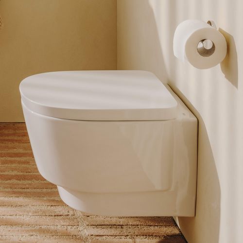 Wandhängendes WC - TURA - ROCA - Keramik / für Privatgebrauch / rund