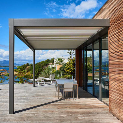 Selbsttragende Pergola - SUNEAL TY - TECHNAL - angebaut / Aluminium / motorisiert