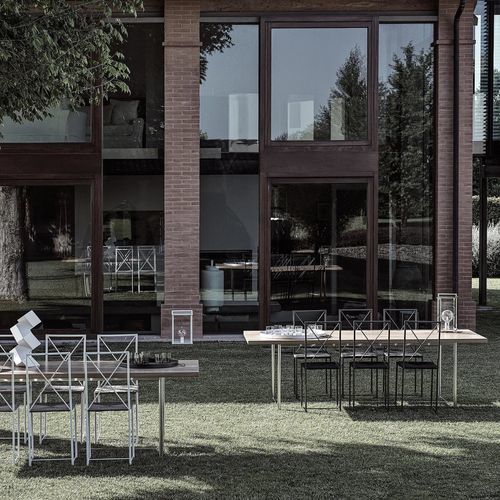Moderner Esstisch - LEVANTE - FLEXFORM - Massivholz / Iroko / Edelstahl