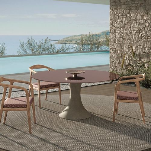 Moderner Tisch - DEVON - LONGHI S.p.a. - Zement / Gestell aus Zement / rund