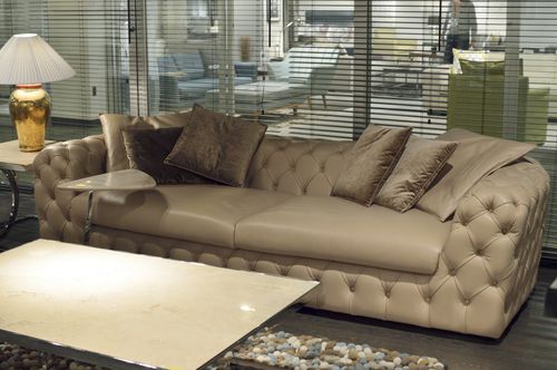 Chesterfield-Sofa - BOA - Stone International - Leder / mit Armlehnen / mit abnehmbarem Kissen