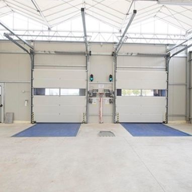 Tür für Innenbereich - SECTIONAL DOORS - Moreschi Chiusure Industriali S.r.l. - Stahl / Polyurethan / galvanisiertem Stahl