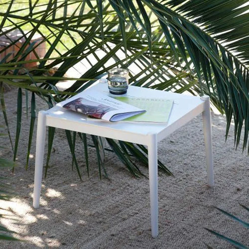 Moderner Couchtisch - LUCE - Unopiù - Sandstein / Gestell aus Aluminium / rechteckig