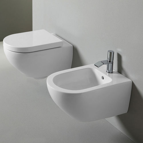 Wandhängendes WC - ENJOY - TALCO - Ceramica Cielo - Keramik / von Karim Rashid / oval