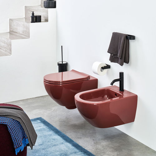 Wandhängendes WC - ENJOY - CORALLO - Ceramica Cielo - Keramik / von Karim Rashid / oval