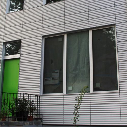 Paneel-Fassadenverkleidung - XWAVE - PROMOCLAD - Aluminium / gewellt / Grossformat