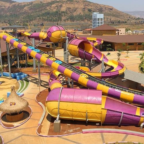 Drehende Rutsche - RATTLER - WhiteWater - für Aquapark / rohrförmig / Mehrfach