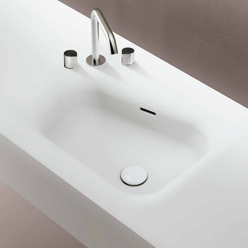 Eingebautes Waschbecken - DEDALO - PLANIT - Corian® / mit integrierter Waschtischplatte / Trapez