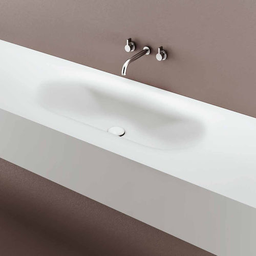 Eingebautes Waschbecken - MOBY - PLANIT - Corian® / mit integrierter Waschtischplatte / oval